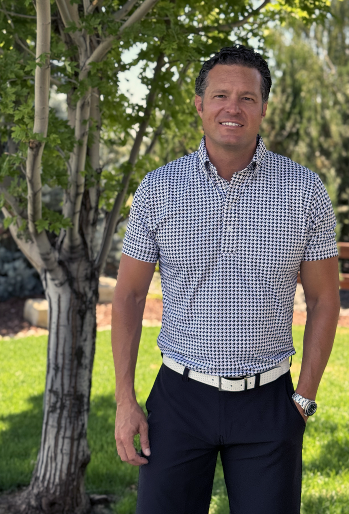 The James button down polo by DAWNKARL in black and white houndstooth